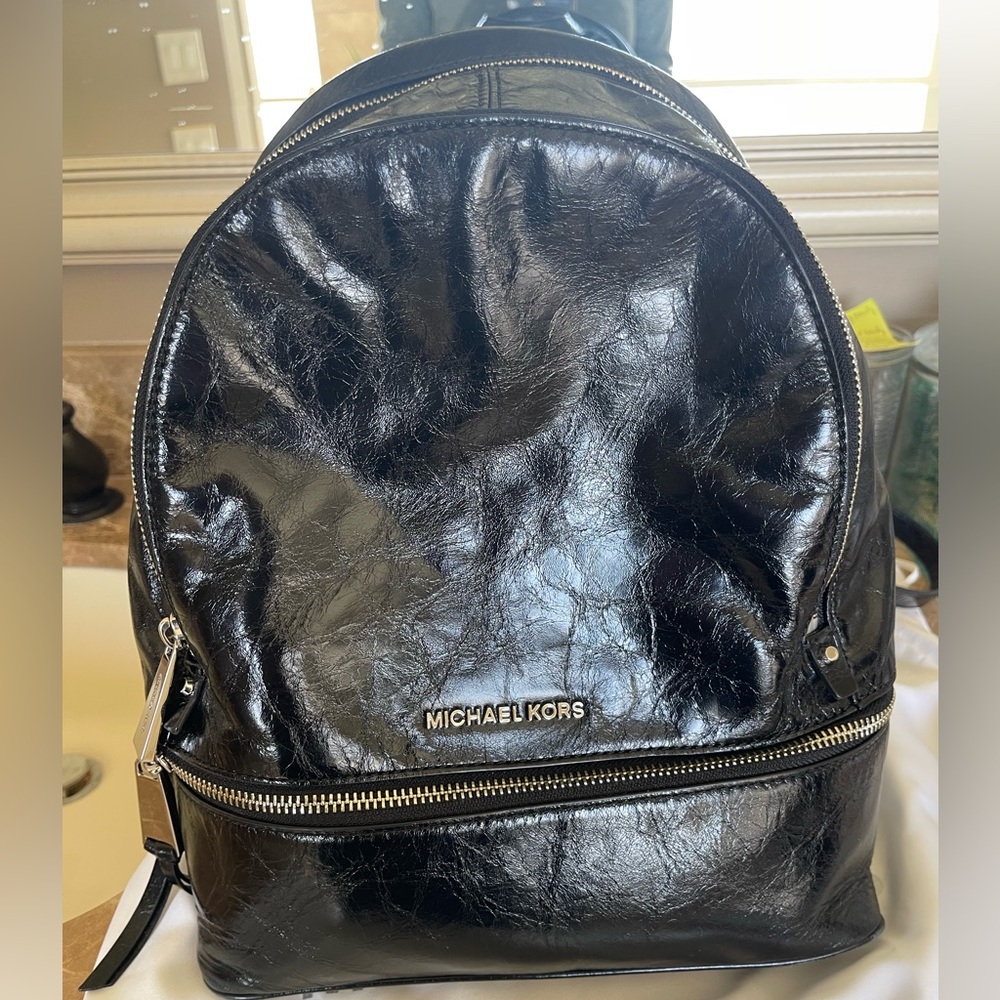 Michael Kors leather backpack/purse